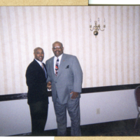 MAF0187_photo-of-two-men-standing-at-an-naacp-event.jpg
